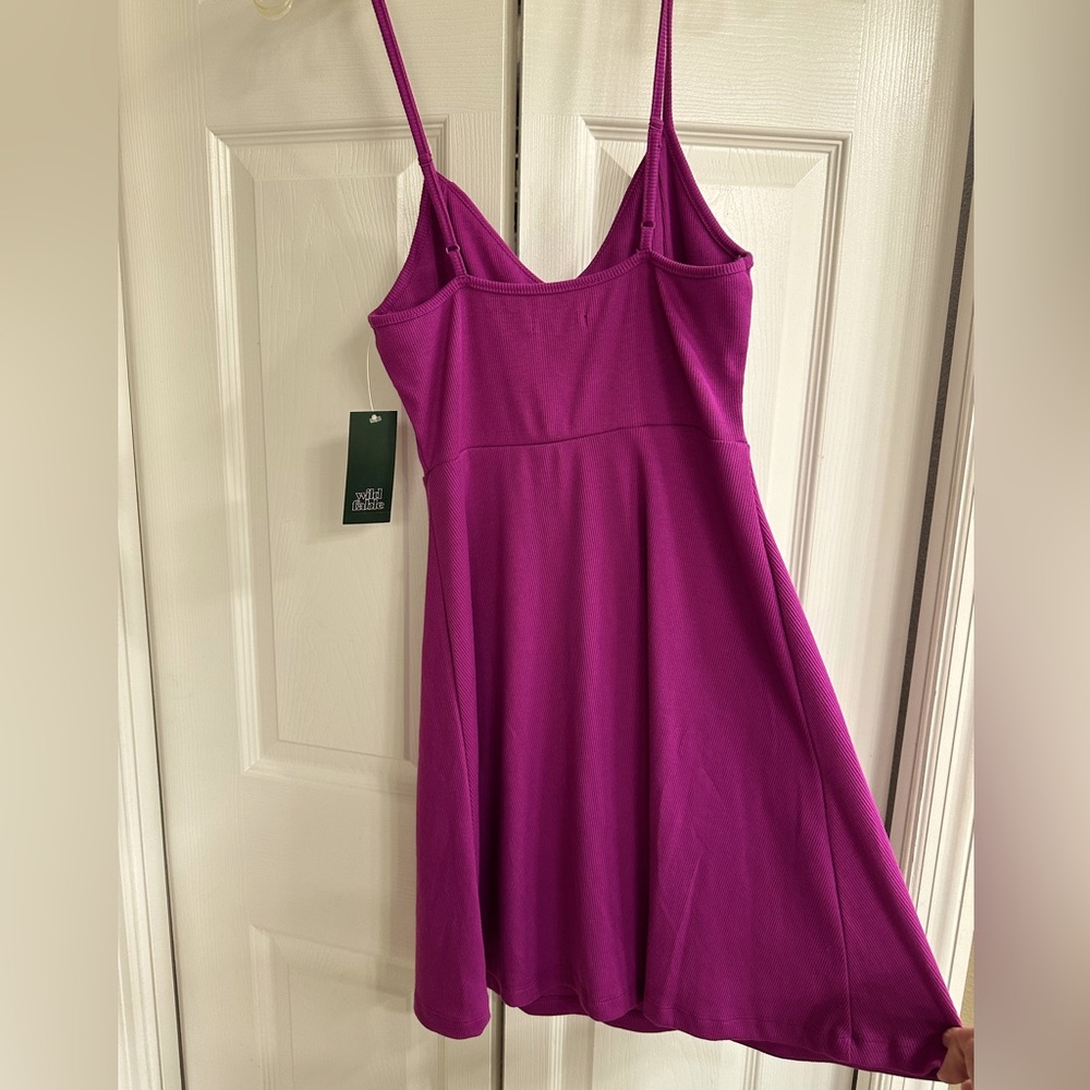 Small plum purple mini knit skater dress.